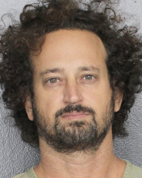 Florida dentist charged with hiring hit men to kill brother-in-law