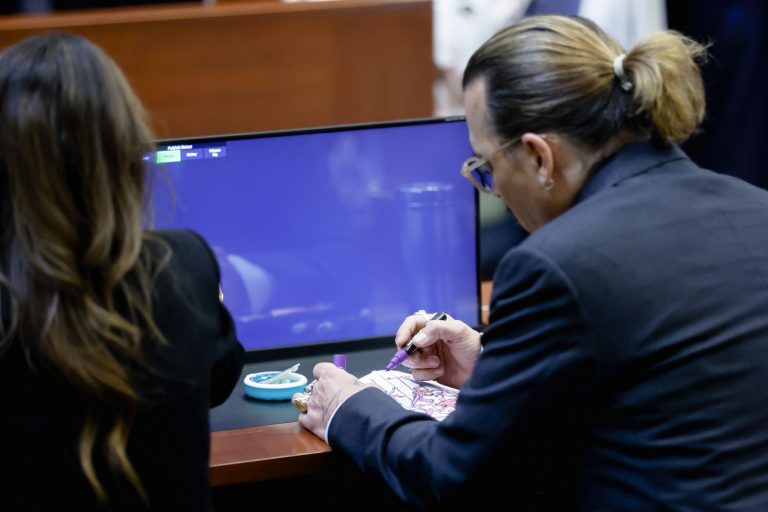 WATCH: Johnny Depp amuses himself with doodling artwork during court case