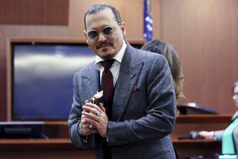 Actor Johnny Depp arrives in the courtroom at the Fairfax County Circuit Court in Fairfax, Virginia, Thursday, April 28, 2022.
