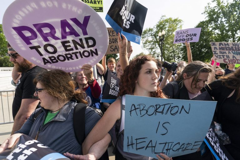 Demonstrators protest outside of the U.S. Supreme Court on May 3 in Washington, D.C. 