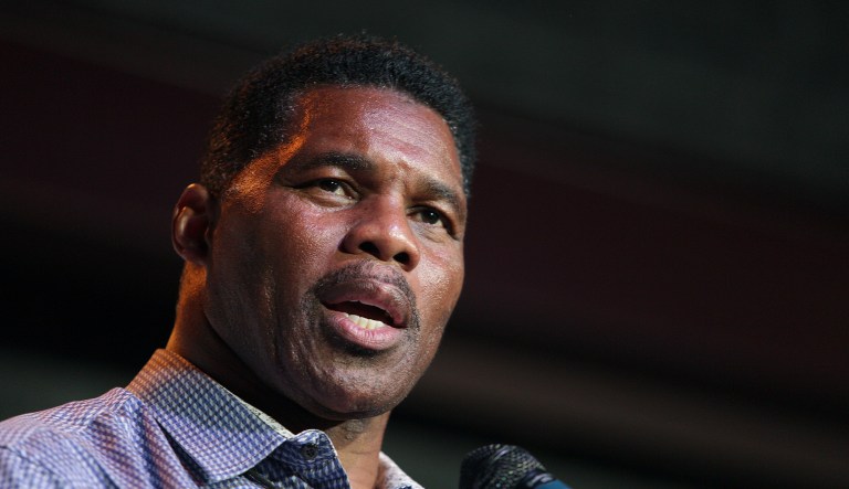 Herschel Walker, GOP candidate for Senate in Georgia, speaks at a primary watch party.