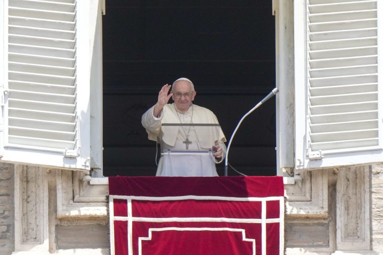 Pope Francis recites the Angelus noon prayer from his studio's window that overlooks St.Peter's Square, at the Vatican, Sunday, July 3, 2022. 