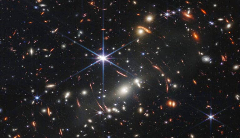 This image provided by NASA on Monday, July 11, 2022, shows galaxy cluster SMACS 0723.