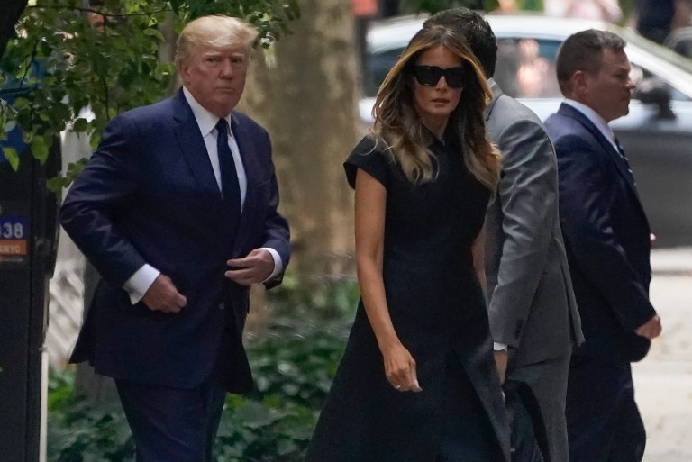 Former President Donald Trump, left, arrives with Melania Trump for the funeral of Ivana Trump, Wednesday, July 20, 2022, in New York. The former first lady claims she was 