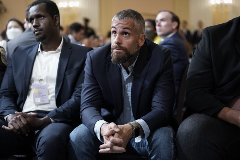  Ex-DC police officer who was beaten on Jan. 6 heckled by protesters outside hearing