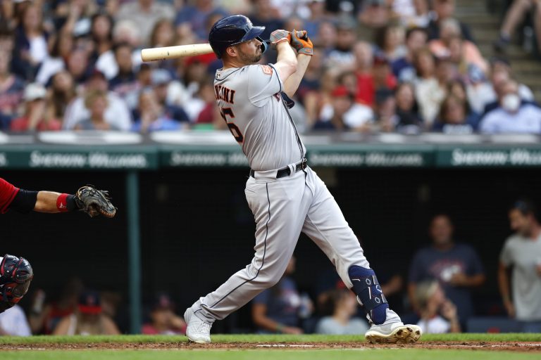 Houston Astros' Trey Mancini watches his grand slam off Cleveland Guardians starting pitcher Hunter Gaddis during the third inning of a baseball game Friday, Aug. 5, 2022, in Cleveland.