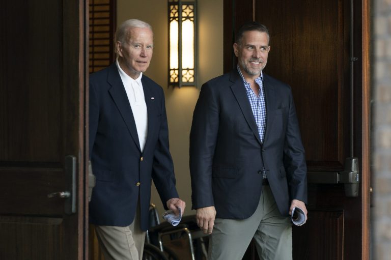 President Joe Biden and his son Hunter Biden leave Holy Spirit Catholic Church in Johns Island, South Carolina, after attending a Mass, Saturday, Aug. 13, 2022.