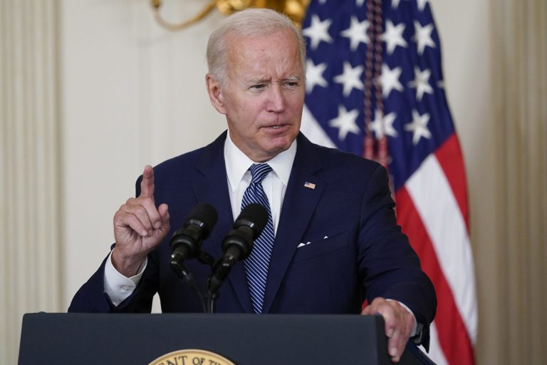 President Joe Biden speaks before signing the Democrats' landmark climate change and healthcare bill in the State Dining Room of the White House in Washington, Tuesday, Aug. 16, 2022.