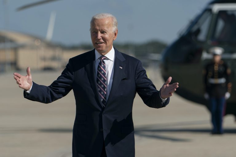 President Joe Biden gestures as he walks to board Air Force One at Andrews Air Force Base, Maryland.