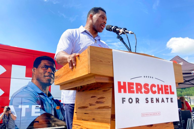 Republican Senate candidate Herschel Walker campaigns in Emerson, Georgia.