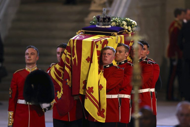 The Imperial State Crown is seen on the coffin carrying Queen Elizabeth II into Westminster Hall for the Lying in State at the Palace of Westminster in London, Wednesday, Sept. 14, 2022. 