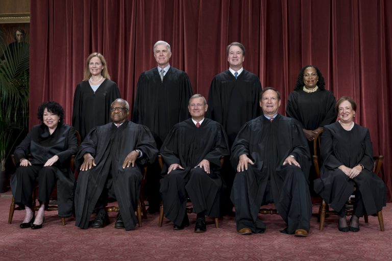 Members of the Supreme Court sit for a new group portrait following the addition of Associate Justice Ketanji Brown Jackson.