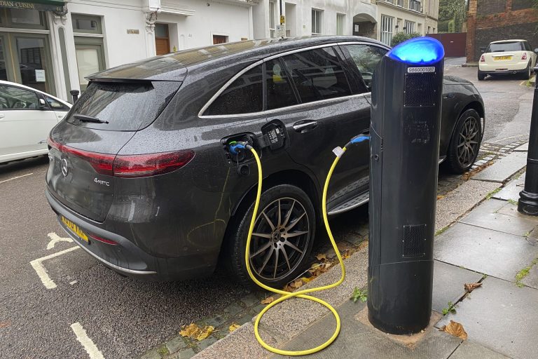 European cities are far ahead of the U.S. when it comes to making fast-charging accessible for electric vehicle owners. Yet, drivers in Switzerland may be banned from using their EVs if the country's energy crisis continues amid the war in Ukraine. Seen here, an electric vehicle charges in London on Oct. 20, 2022. 