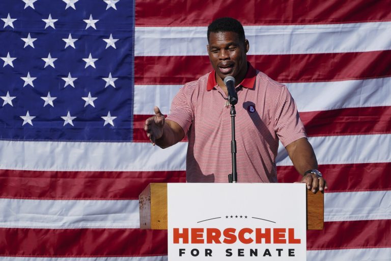 Walker supporters look past scandal as football legend woos conservatives ahead of runoff