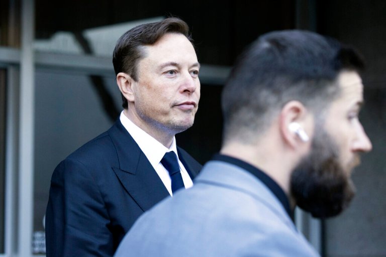 Elon Musk leave the Phillip Burton Federal Building and United States Court House in San Francisco, Tuesday, Jan. 24, 2023.