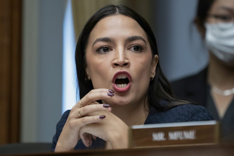 Rep. Alexandria Ocasio-Cortez, D-N.Y., the vice ranking member of the House Committee on Oversight and Accountability, votes on a Democratic amendment to the rules during an organizational meeting for the 118th Congress, at the Capitol in Washington, Tuesday, Jan. 31, 2023. 