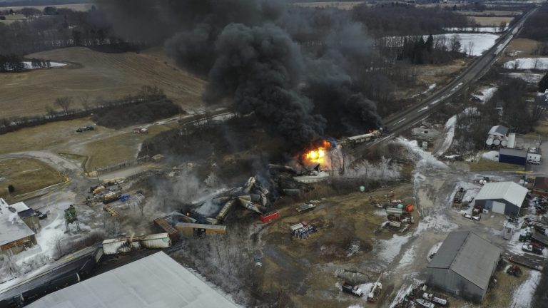 This photo taken with a drone shows portions of a Norfolk and Southern freight train that derailed Friday night in East Palestine, Ohio are still on fire at mid-day Saturday, Feb. 4, 2023.