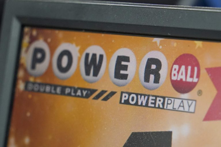 A display panel advertises tickets for a Powerball drawing.
