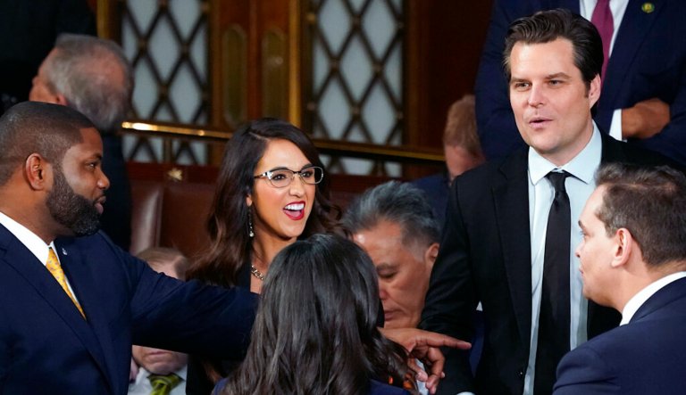 Rep. Lauren Boebert (R-CO), center, and Rep. Matt Gaetz (R-FL), right, talk to other members on the House floor before President Joe Biden arrives to deliver his State of the Union speech to a joint session of Congress, at the Capitol in Washington, Tuesday, Feb. 7, 2023.