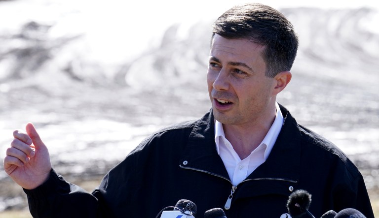 Transportation Secretary Pete Buttigieg speaks during a news conference Thursday, Feb. 23, 2023, near the site of the Feb. 3 Norfolk Southern train derailment in East Palestine, Ohio.