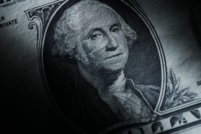 The likeness of George Washington is seen on a U.S. one dollar bill, Monday, March 13, 2023, in Marple Township, Pennsylvania. (AP Photo/Matt Slocum)