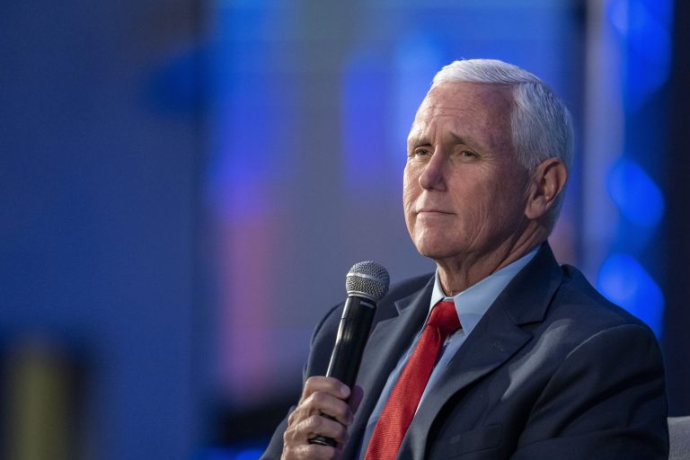 Former Vice President Mike Pence pauses while speaking at the Federalist Society Executive Branch Review conference, Tuesday, April 25, 2023, in Washington. 