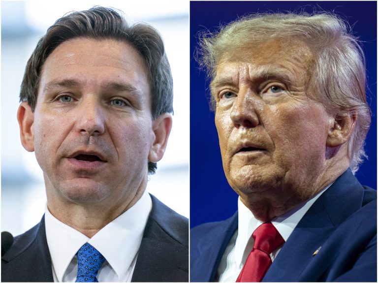This combination of photos shows Florida Gov. Ron DeSantis speaking on April 21, 2023, in Oxon Hill, Md., left, and former President Donald Trump speaking on March 4, 2023, at National Harbor in Oxon Hill, Md.