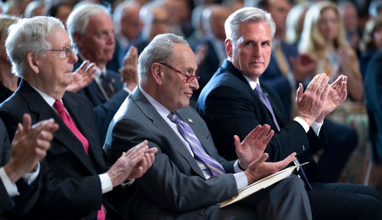 From left, Senate Minority Leader Mitch McConnell, R-Ky., Senate Majority Leader Chuck Schumer, D-N.Y., and Speaker of the House Kevin McCarthy, R-Calif., sit together during a ceremony at the Capitol in Washington, Wednesday, May 17, 2023. 
