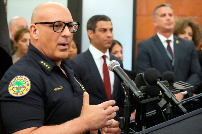 Miami Chief of Police Manuel Morales speaks during a news conference alongside Mayor Francis Suarez, center, about the security planned for former President Donald Trump, who is set to appear at federal court Tuesday, in Miami. 