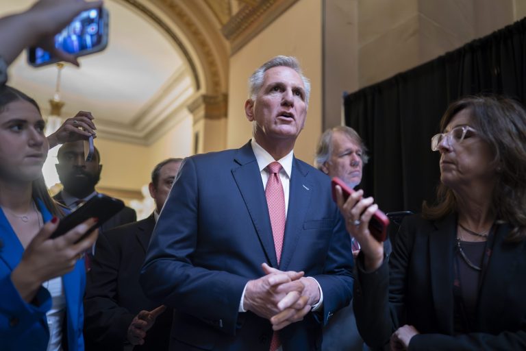  House Speaker Kevin McCarthy (R-CA) walks with reporters after votes in the House at the Capitol in Washington on Thursday, June 22, 2023. 
