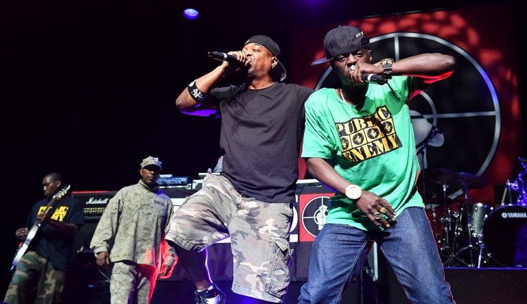 Rappers Flavor Flav, right, and Chuck D of the band Public Enemy perform at the O2 Arena in London, Thursday, June 16, 2016.