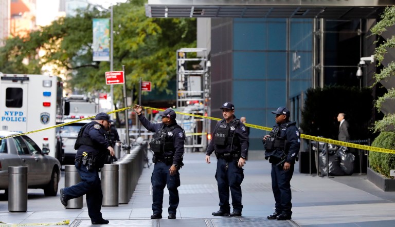 New York City Police Department officers arrive outside the Time Warner Center in New York, Wednesday, Oct. 24, 2018.