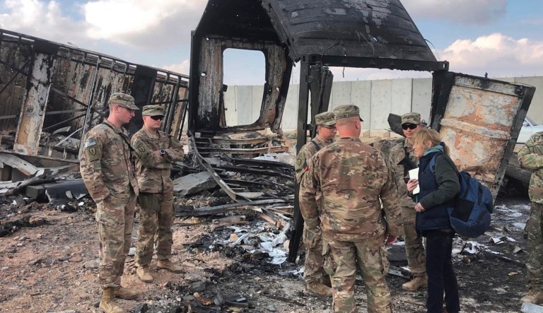 U.S. Soldiers stand amid damage at a site of Iranian bombing at Ain al-Asad air base, in Anbar, Iraq, Monday, Jan. 13, 2020. Ain al-Asad air base was struck by a barrage of Iranian missiles on Wednesday, in retaliation for the U.S. drone strike that killed atop Iranian commander, Gen. Qassem Soleimani, whose killing raised fears of a wider war in the Middle East.