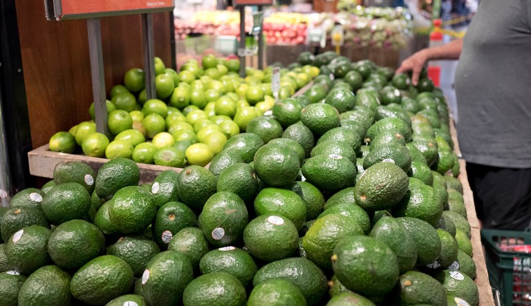 A man shops for avocados at a Whole Foods Market, Monday, Aug. 28, 2017, in New York.