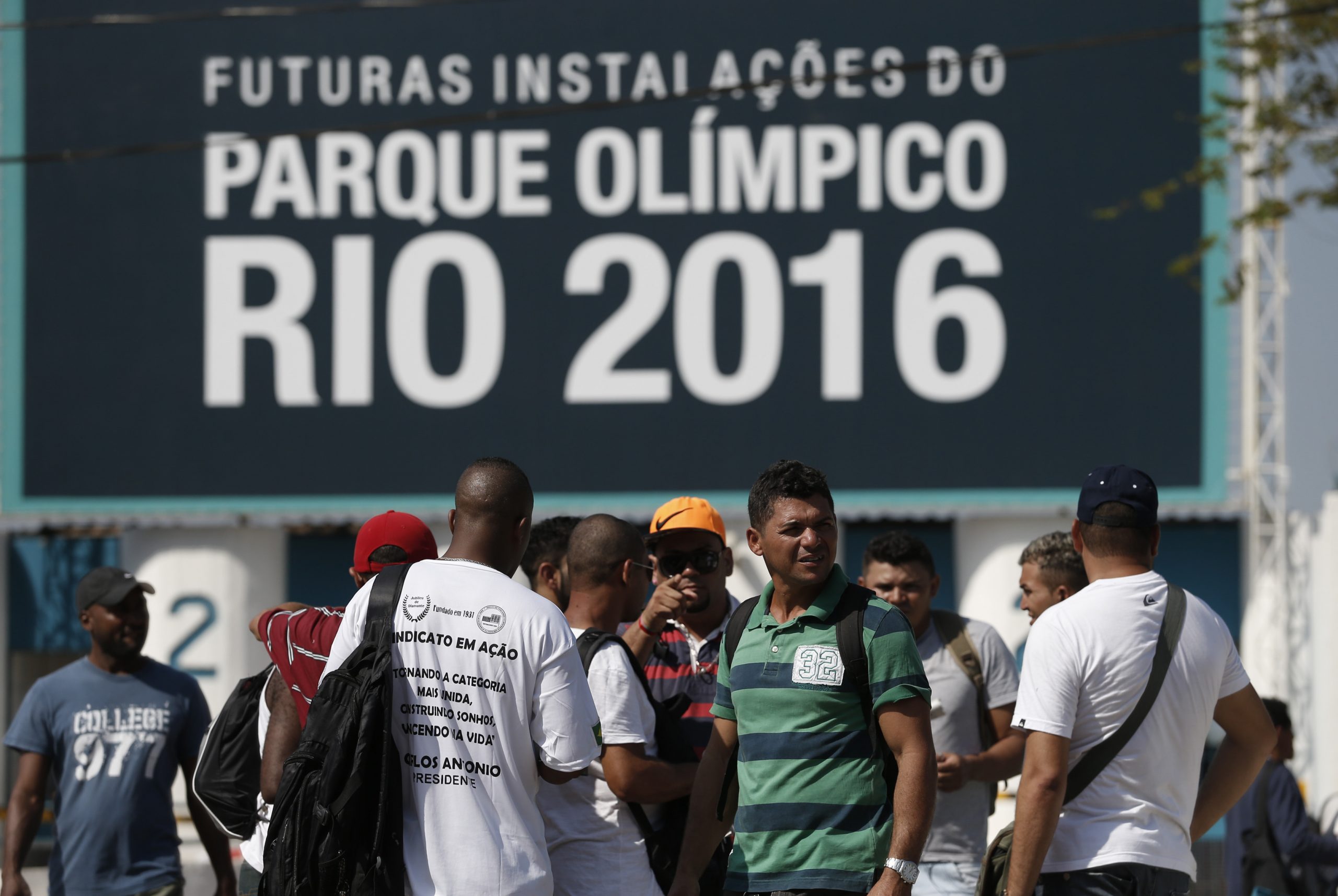 Olympic workers defy court order, stay on strike