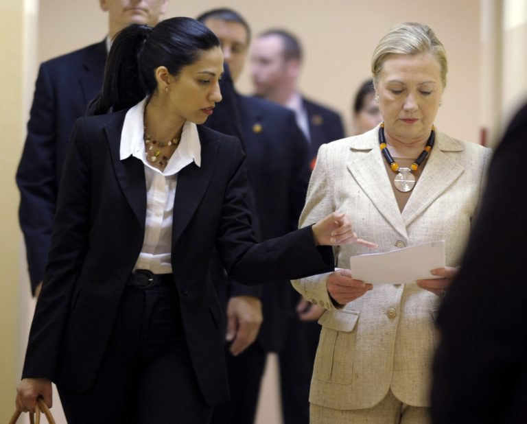 Huma Abedin, aide to Secretary of State Hillary Clinton, left, during their visit to Zambia. (AP Photo/Susan Walsh, Pool)