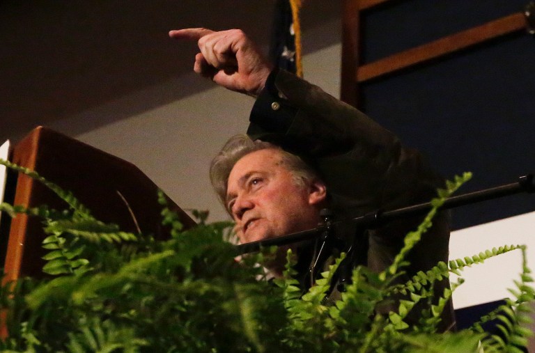 Former White House strategist Steve Bannon speaks at a rally for U.S. Senate candidate Roy Moore, Tuesday, Sept. 26, 2017, in Montgomery, Ala. Bannon took the stage to introduce Moore as supporters waving flags cheered Tuesday night. Bannon declared Moore's win a victory for Trump, despite the president's support for Sen. Luther Strange. (AP Photo/Brynn Anderson)