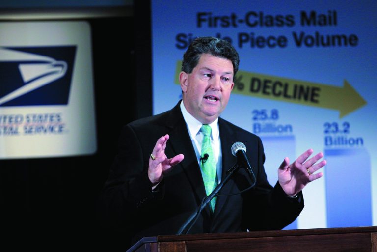 Postmaster General and CEO Patrick R. Donahoe speaks during a news conference at U.S. Postal Service headquarters Wednesday Feb. 6, 2013, in Washington. The financially struggling U.S. Postal Service says it will stop delivering mail on Saturdays but continue to disburse packages six days a week. (AP Photo/Jose Luis Magana)