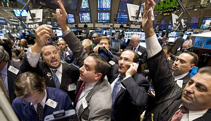 Traders on the New York Stock Exchange floor. (thetaxhaven.com/Flickr)