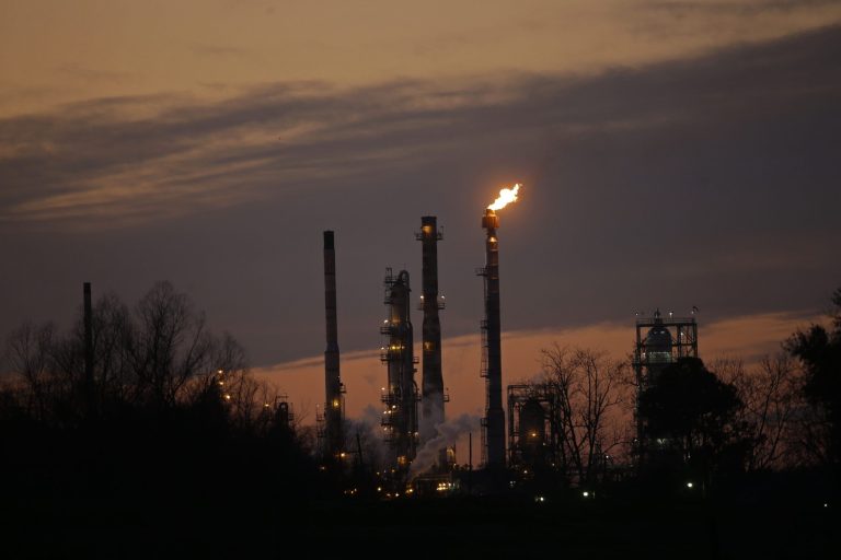 The Obama administration says new environmental rules for petroleum refineries will make the air around them much safer for families.Â (AP Photo/Gerald Herbert)