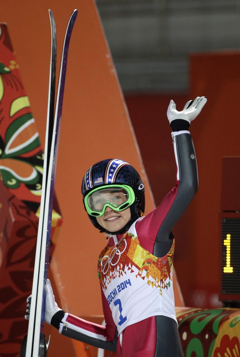 United States' Sarah Hendrickson smiles and waves after her first attempt during the women's normal hill ski jumping final at the 2014 Winter Olympics, Tuesday, Feb. 11, 2014, in Krasnaya Polyana, Russia. (AP Photo/Gregorio Borgia)