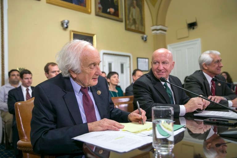 House Ways and Means Committee Chairman Rep. Kevin Brady, R-Texas, center, and the committee's ranking member, Rep. Sander Levin, D-Mich., left, discussed the Affordable Care Act's costs. (AP Photo/J. Scott Applewhite, File)
