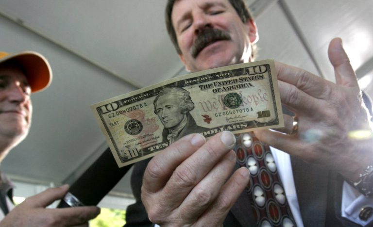 Treasury chief says the design of the new bill, which will feature a woman, will be announced 