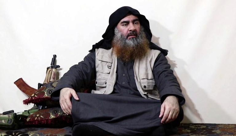 This image made from video posted on a militant website on Monday, April 29, 2019, purports to show the leader of the Islamic State group, Abu Bakr al-Baghdadi, being interviewed by his group's Al-Furqan media outlet.