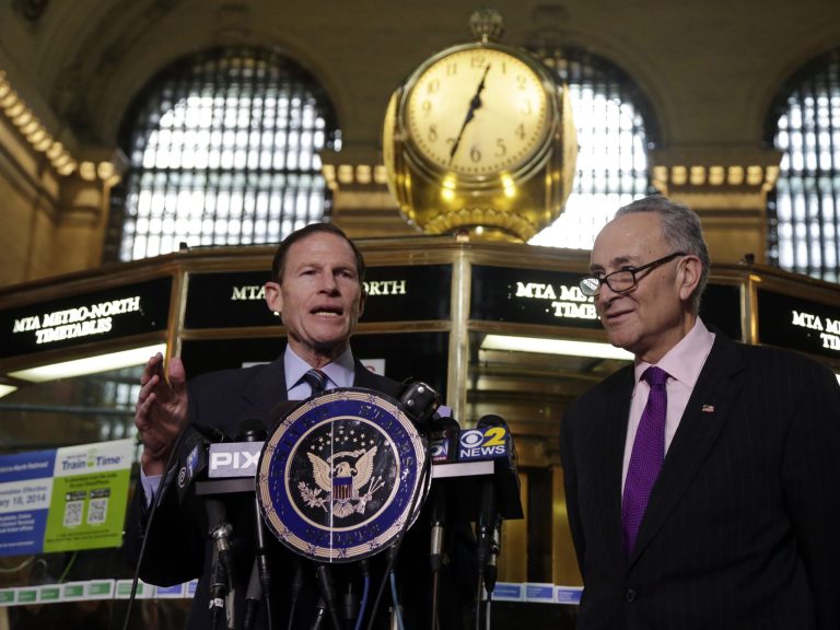 U.S. Sen. Richard Blumenthal, D-CT, left, and U.S. Sen. Charles Schumer, D-NY, comment during a news conference on a report by the Federal Railroad Administration about the Metro-North Railroad, at the information booth in New York's Grand Central Terminal, Friday, March 14, 2014. Metro-North commuter railroad has allowed an overemphasis on train times to 