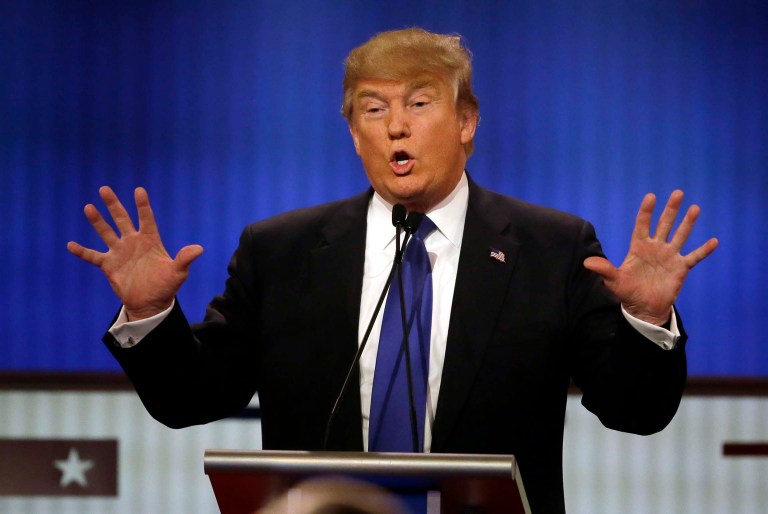 According to an analysis, Donald Trump's major tax initiatives would add $12 to $15 trillion to the debt. (AP Photo/Carlos Osorio)