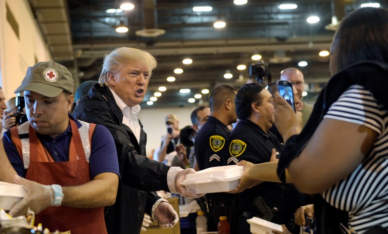 A Hurricane Harvey survivor praised President Trump for visiting Houston on Saturday in the wake of the storm to show his solidarity with the victims. (AP Photo/Susan Walsh)