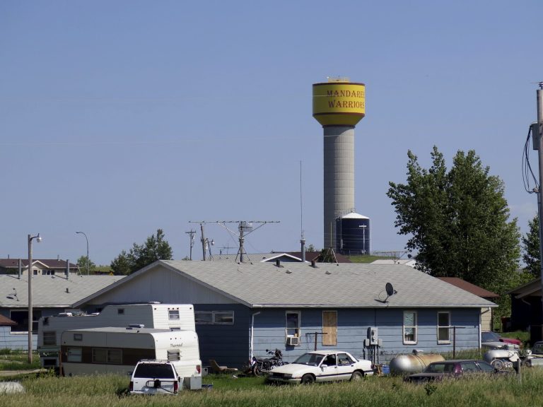 A house in Mandaree, N.D., on the Fort Berthold Indian . AnÃÂ underground pipeline several miles from Mandaree spewed 1 million gallons of saltwater, an oil production byproduct, into North Dakota's badlands in early July. For reservation residents, there is a difficult balance between the potential prosperity of oil and gas and the conservation of a land regarded as sacred by cultural beliefs. (AP Photo/Josh Wood)