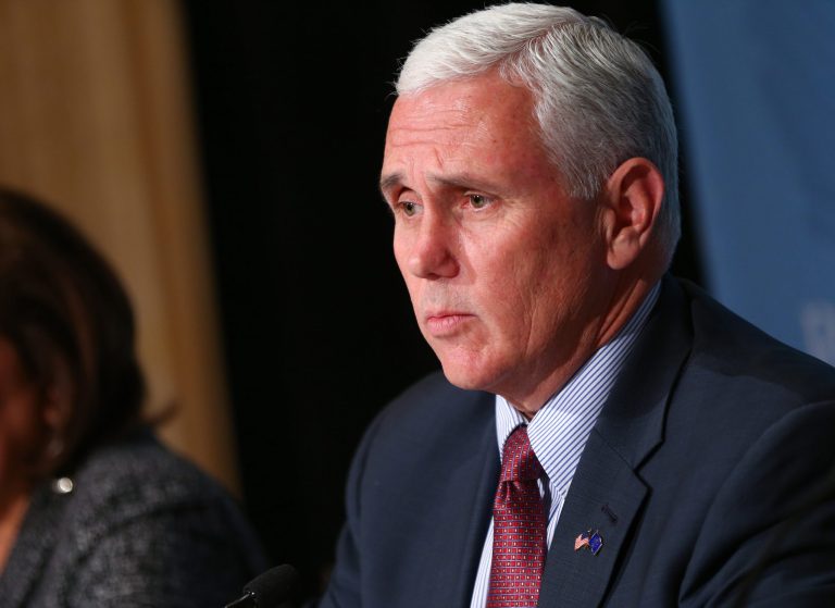 Donald Trump may have rescued Indiana Gov. Mike Pence from a political ditch after a battle over religious freedom last year. (AP Photo/Chase Stevens)