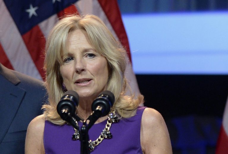 FILE - This April 7, 2014 file photo shows Jill Biden, wife of Vice President Joe Biden, speaking in Washington. Jill Biden, the wife of Vice President Joe Biden, is highlighting female empowerment, education and leadership on a tour of three African countries this week. She is scheduled to arrive in Lusaka, Zambia on Tuesday. Biden is scheduled to be accompanied in Zambia by Rajiv Shah, director of the U.S. Agency for International Development. Stops also are planned in the Democratic Republic of Congo and Sierra Leone before Biden returns to Washington next week. (AP Photo/Susan Walsh, File)